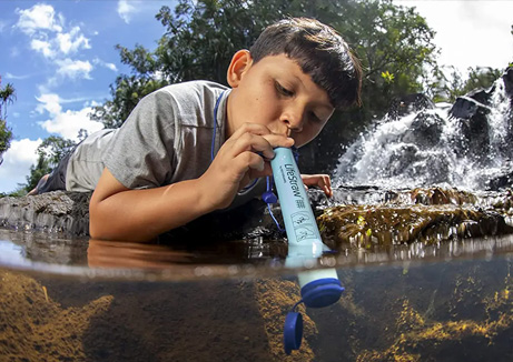 Kid testing alkaline in water