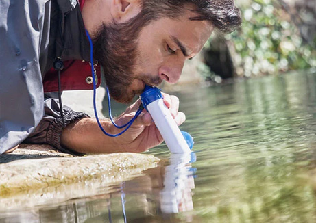 man testing alkaline in water